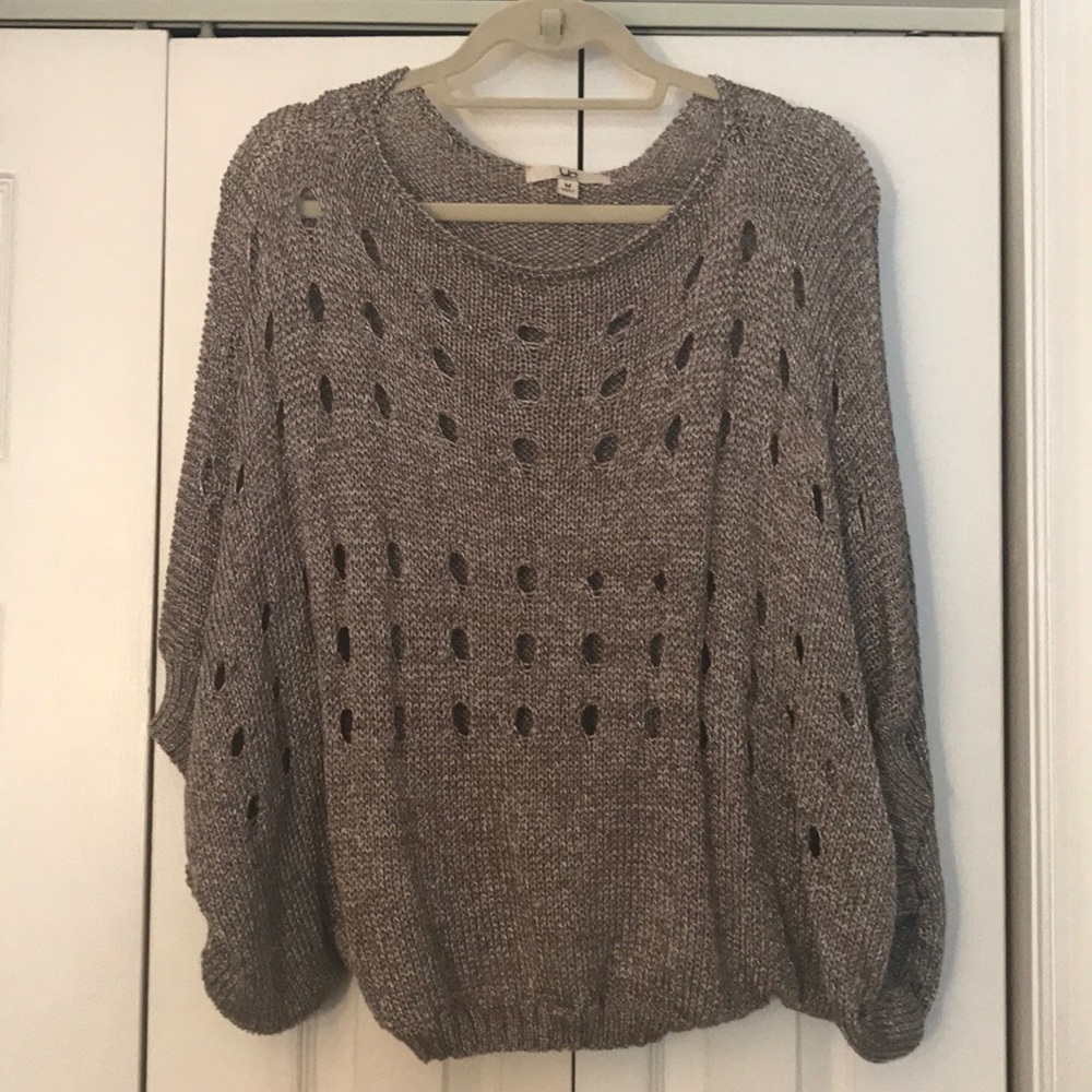 Sweater with holes